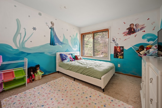 bedroom with baseboards and carpet flooring