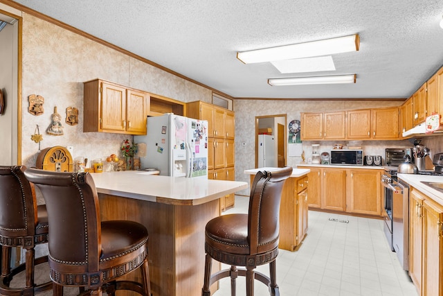 19074 Sumpter Rd, Belleville, MI 48111 - kitchen with ornamental molding, white refrigerator with ice dispenser, gas range, and wallpapered walls