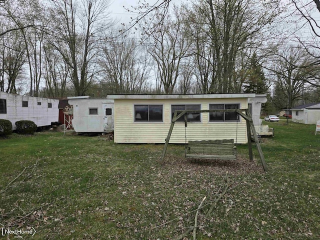 view of front of property with a front lawn
