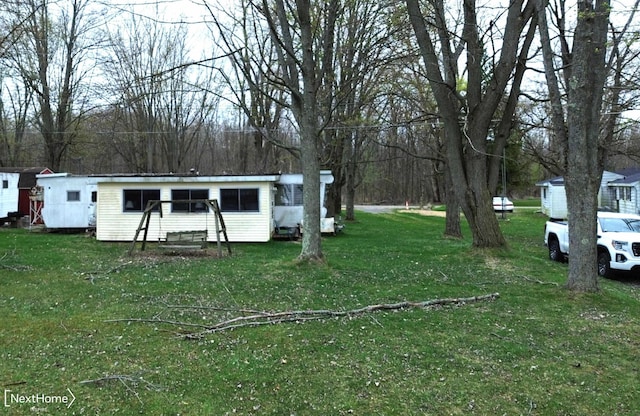 view of yard featuring entry steps