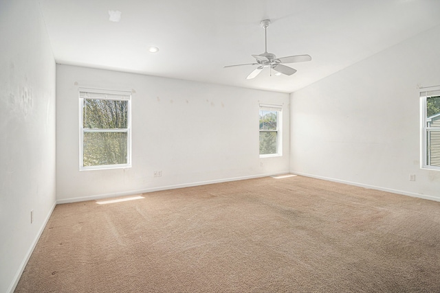 823 Glenlivet St, Howell, MI 48843 - unfurnished room featuring ceiling fan, plenty of natural light, and light carpet