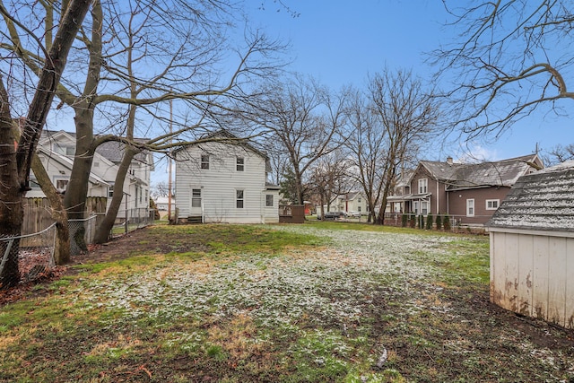 view of yard featuring a residential view and a fenced backyard