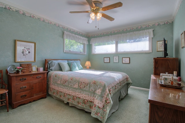 bedroom featuring a ceiling fan, baseboards, and light colored carpet