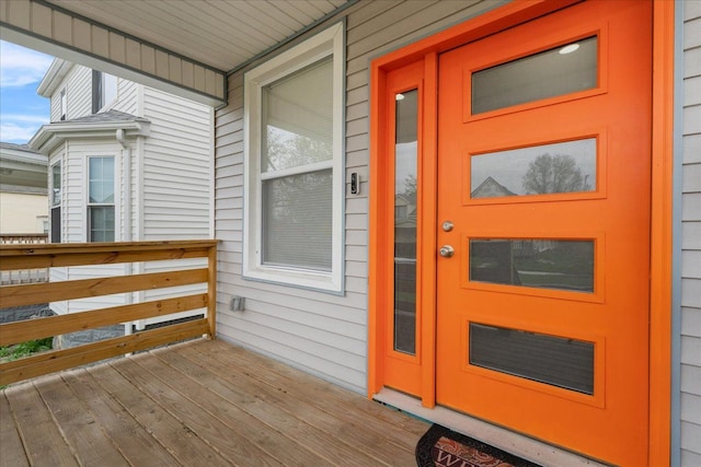 view of exterior entry with covered porch