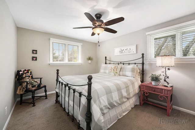 carpeted bedroom with a ceiling fan and baseboards