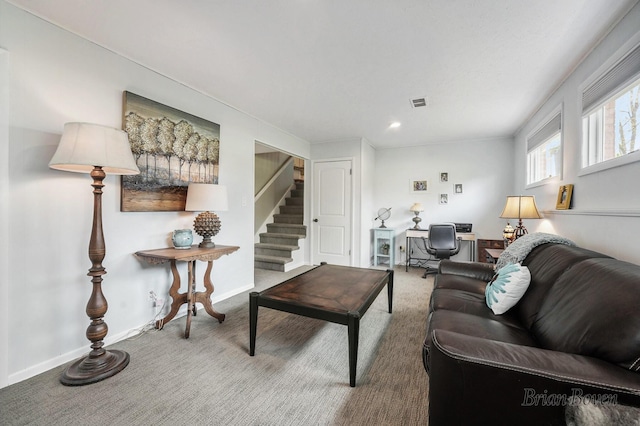 living area with carpet flooring, stairs, recessed lighting, baseboards, and visible vents
