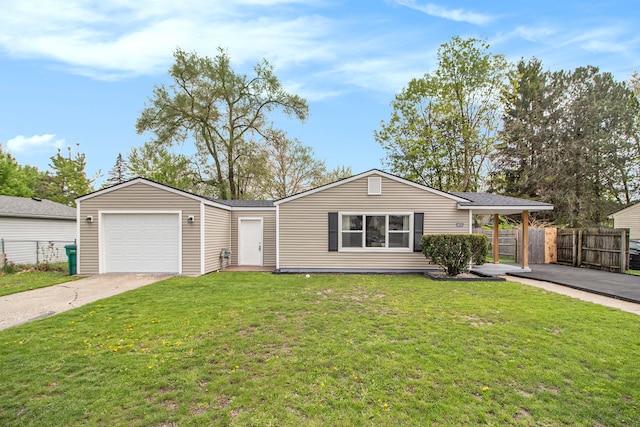 ranch-style home with concrete driveway and an attached garage