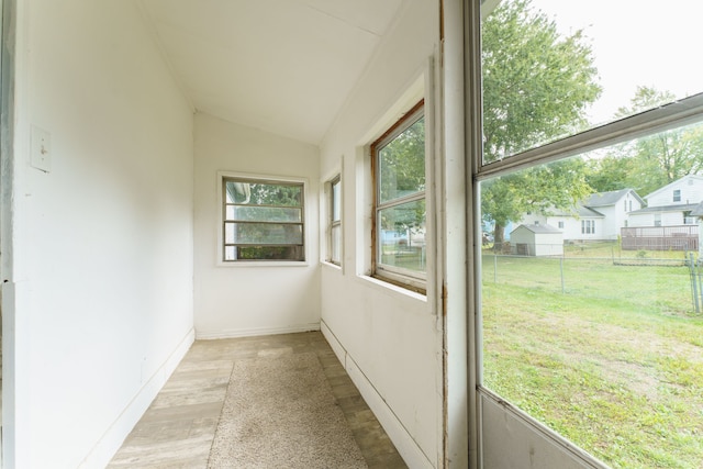 unfurnished sunroom with plenty of natural light