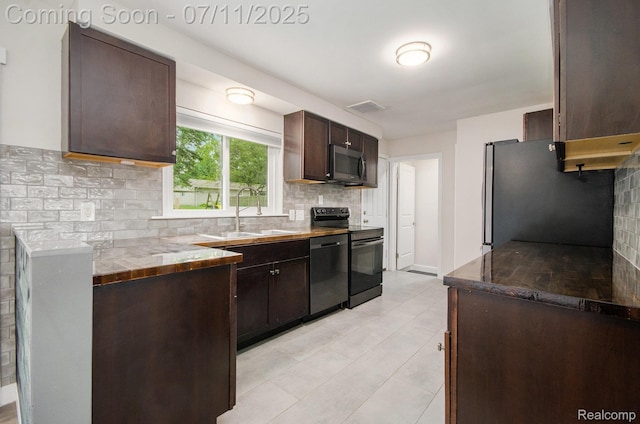 1082 Genella St, Waterford, MI 48328 - kitchen featuring stainless steel appliances, tasteful backsplash, dark brown cabinetry, and light tile patterned floors