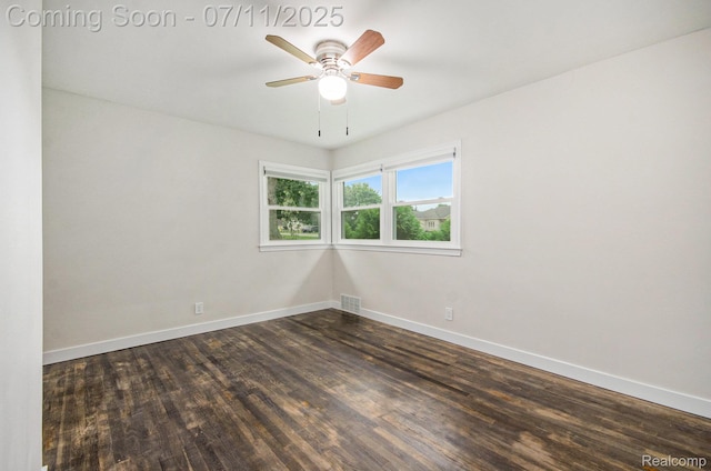 1082 Genella St, Waterford, MI 48328 - empty room featuring dark wood-style floors and ceiling fan