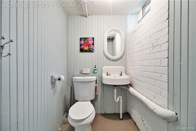 1301 Bishop Rd, Grosse Pointe Park, MI 48230 - half bathroom with toilet, concrete flooring, and a sink