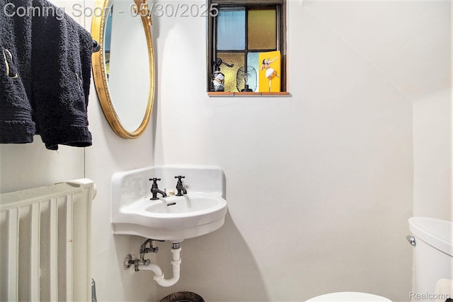 1301 Bishop Rd, Grosse Pointe Park, MI 48230 - bathroom with radiator and toilet