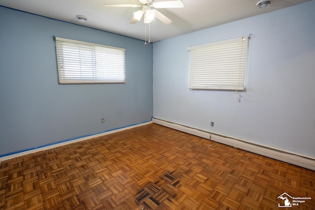 3336 Springdale St, Lambertville, MI 48144 - unfurnished room featuring baseboards, a baseboard radiator, and ceiling fan