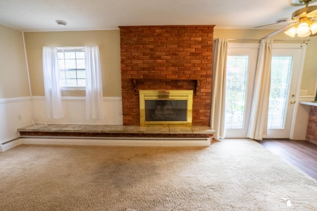3336 Springdale St, Lambertville, MI 48144 - unfurnished living room with carpet, a ceiling fan, and a brick fireplace