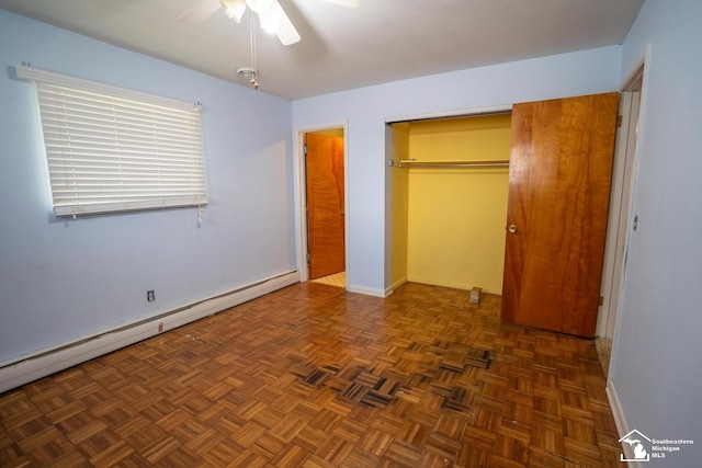 3336 Springdale St, Lambertville, MI 48144 - unfurnished bedroom with a closet, baseboards, ceiling fan, and a baseboard heating unit