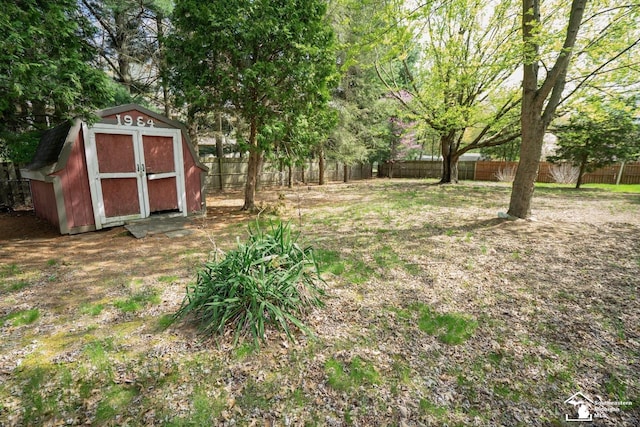 3336 Springdale St, Lambertville, MI 48144 - view of yard with a fenced backyard, a storage unit, and an outbuilding