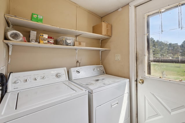 laundry area with laundry area and independent washer and dryer