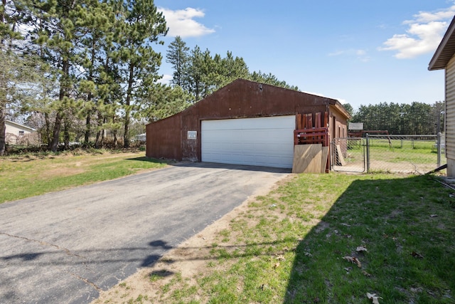 exterior space featuring a gate and fence