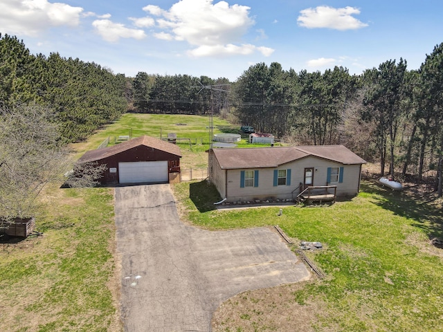 aerial view featuring a wooded view