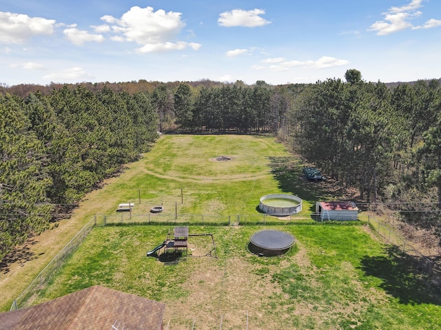bird's eye view featuring a view of trees