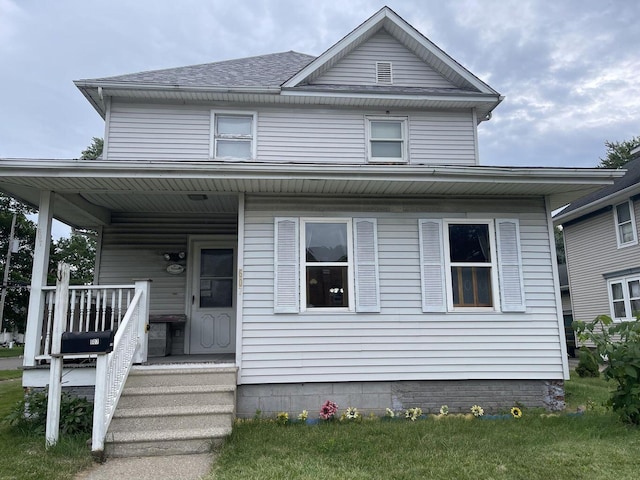 view of front of property featuring covered porch