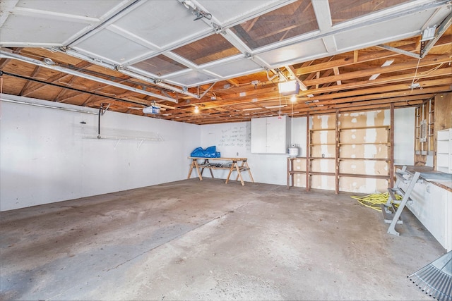 6093 Porter Rd, Grand Blanc, MI 48439 - garage featuring a garage door opener