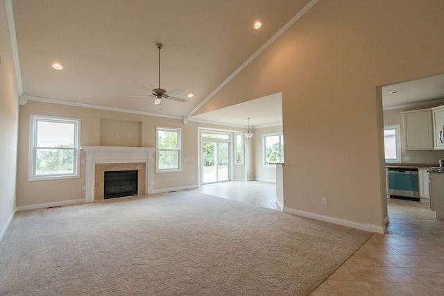 unfurnished living room featuring baseboards, crown molding, a fireplace, and ceiling fan
