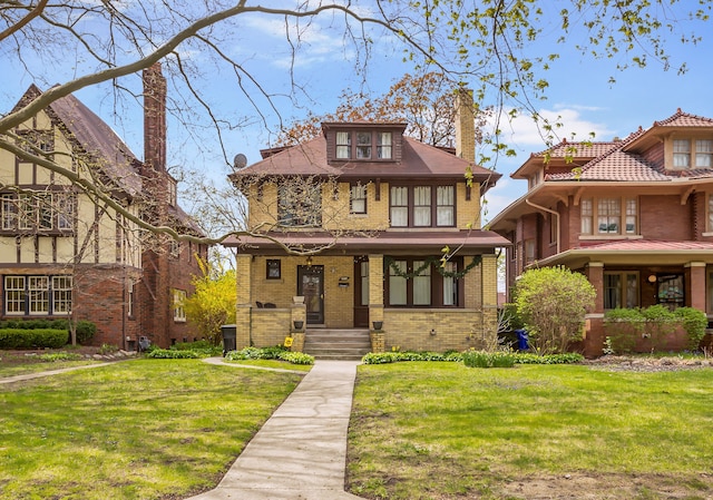 traditional style home featuring covered porch, a chimney, a front lawn, and brick siding