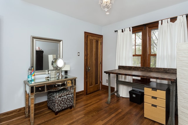 office with an inviting chandelier, baseboards, and dark wood-style floors
