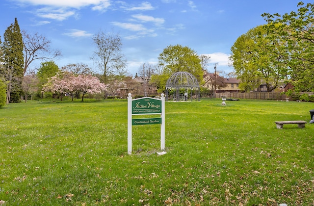 surrounding community featuring a gazebo and a lawn
