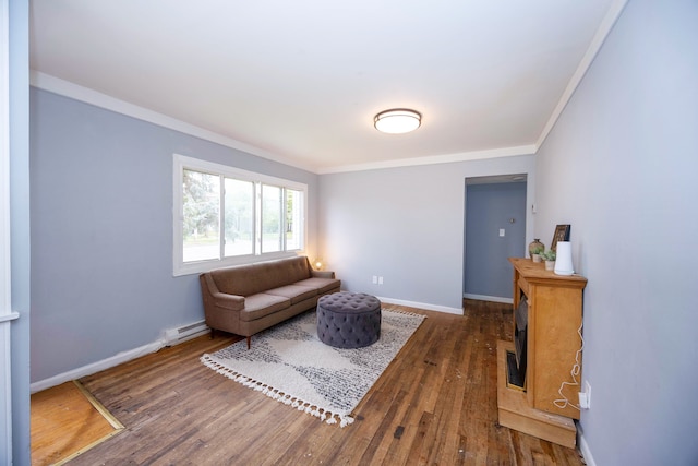 137 W Sheffield Ave, Pontiac, MI 48340 - living area with baseboards, dark wood-style flooring, ornamental molding, and a baseboard heating unit