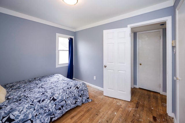 137 W Sheffield Ave, Pontiac, MI 48340 - bedroom with baseboards and wood-type flooring