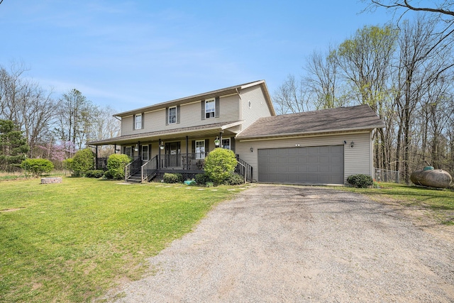 view of front facade featuring an attached garage, a front lawn, covered porch, and driveway