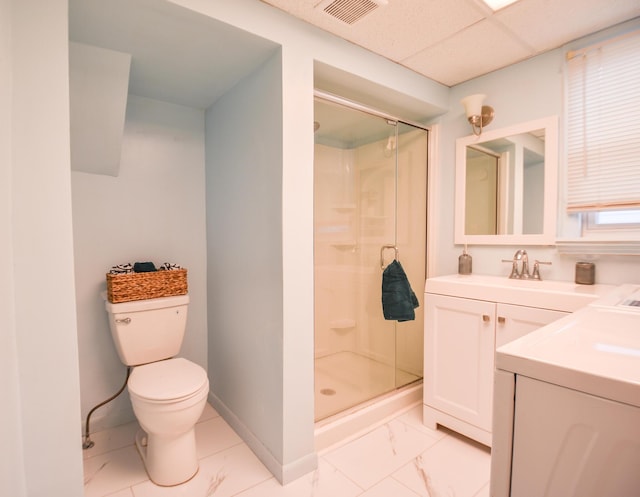 bathroom with visible vents, washer / dryer, toilet, and a shower stall