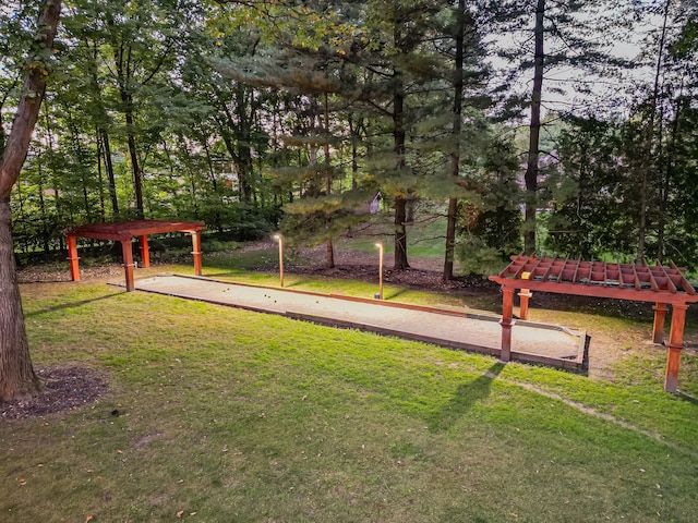 17477 Iris Cir, Clinton Township, MI 48036 - view of home's community with a bocce ball area, a pergola, and a yard