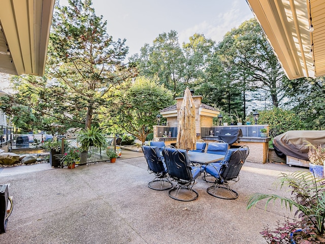 17477 Iris Cir, Clinton Township, MI 48036 - view of patio / terrace with outdoor dining space