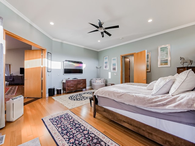 17477 Iris Cir, Clinton Township, MI 48036 - bedroom featuring light wood-style flooring, recessed lighting, ornamental molding, and ceiling fan