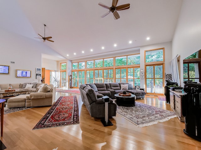 17477 Iris Cir, Clinton Township, MI 48036 - living room featuring a ceiling fan, high vaulted ceiling, light wood-style flooring, healthy amount of natural light, and recessed lighting