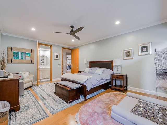17477 Iris Cir, Clinton Township, MI 48036 - bedroom with crown molding, light wood finished floors, recessed lighting, baseboards, and ensuite bath