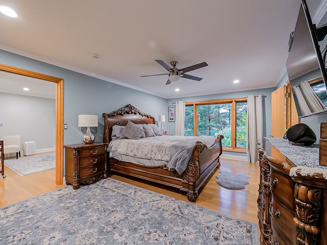 17477 Iris Cir, Clinton Township, MI 48036 - bedroom with light wood-style flooring, recessed lighting, a ceiling fan, and ornamental molding