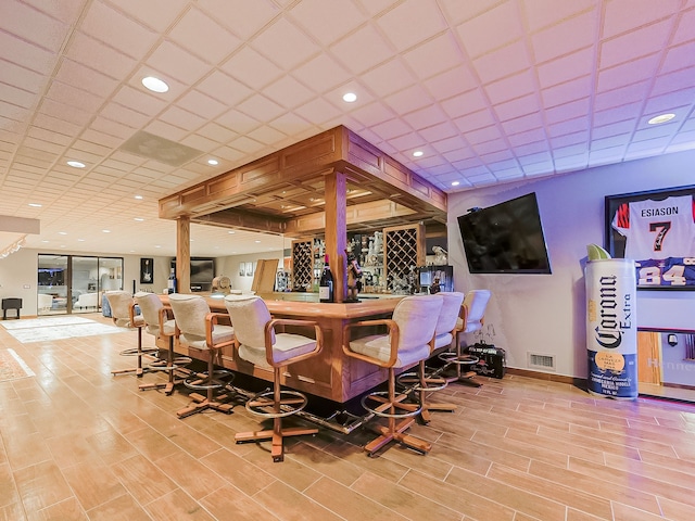 17477 Iris Cir, Clinton Township, MI 48036 - community bar area with wood finished floors, baseboards, and recessed lighting