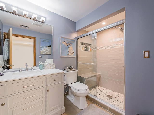 17477 Iris Cir, Clinton Township, MI 48036 - bathroom with a shower stall, toilet, and vanity