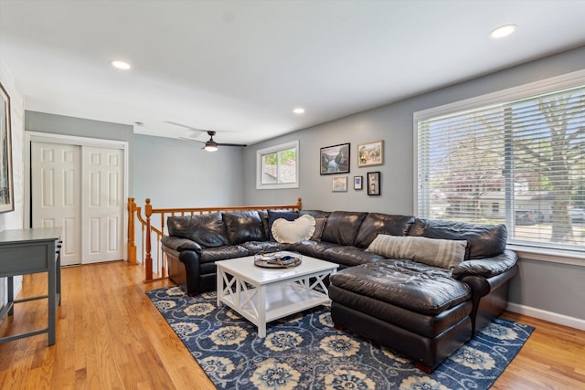 living area featuring ceiling fan, baseboards, light wood finished floors, and recessed lighting