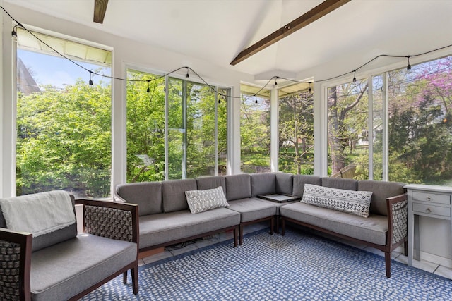 sunroom / solarium with an outdoor hangout area and tile patterned floors