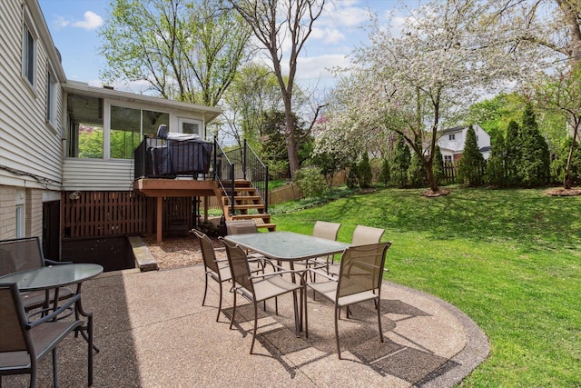 view of patio / terrace featuring stairway, a wooden deck, outdoor dining area, and a fenced backyard
