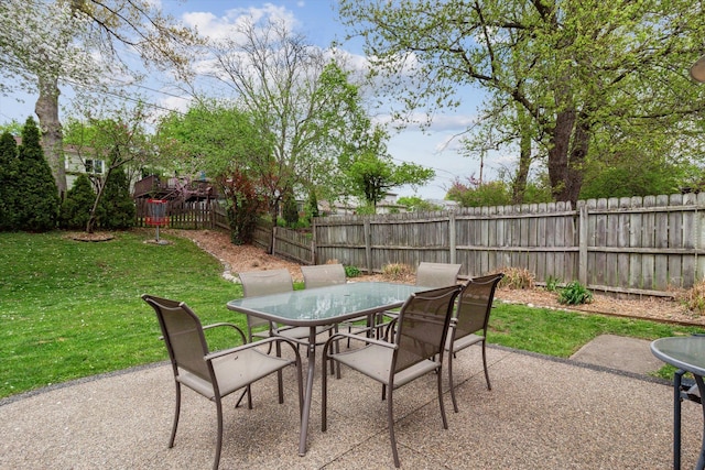 view of patio / terrace featuring outdoor dining space and a fenced backyard
