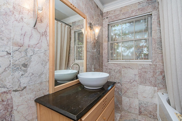 bathroom featuring crown molding, tile walls, vanity, and curtained shower