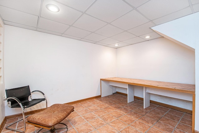 home office featuring recessed lighting, baseboards, and a drop ceiling