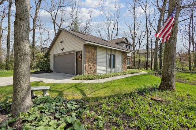 view of side of property with an outdoor structure, a yard, stone siding, and a detached garage