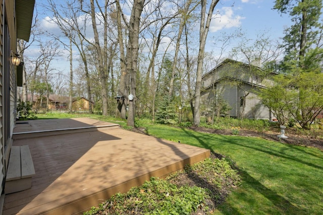 view of yard featuring a wooden deck